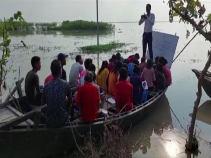 Teachers hold classes on boats amid flood in Bihar's Katihar | Teachers hold classes on boats amid flood in Bihar's Katihar