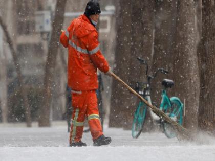 China issues blue alert for heavy snow | China issues blue alert for heavy snow