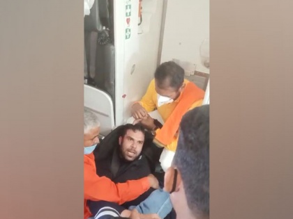 Passenger tries to open emergency door mid-flight, handed over to police in Varanasi: SpiceJet | Passenger tries to open emergency door mid-flight, handed over to police in Varanasi: SpiceJet