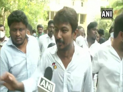 AIADMK files complaint against Stalin's son for sporting party logo while casting vote | AIADMK files complaint against Stalin's son for sporting party logo while casting vote