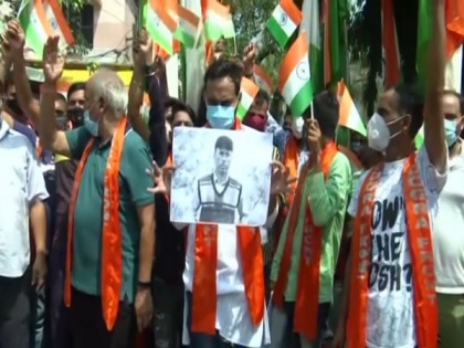 Dogra Front in Jammu stages protest against killing of BJP leader Javed Ahmad Dar | Dogra Front in Jammu stages protest against killing of BJP leader Javed Ahmad Dar