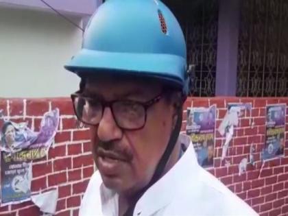 Bengal elections: TMC candidate arrives at polling booth with helmet on head, says wanted to avoid attacks | Bengal elections: TMC candidate arrives at polling booth with helmet on head, says wanted to avoid attacks
