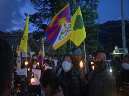 Tibetan people hold vigil in Dharamshala, call on China to end 'repressive policies in Tibet' | Tibetan people hold vigil in Dharamshala, call on China to end 'repressive policies in Tibet'