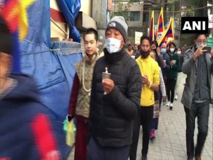 Tibetan activists hold a candlelight vigil in Dharamshala over custodial death of Tibetan in China | Tibetan activists hold a candlelight vigil in Dharamshala over custodial death of Tibetan in China