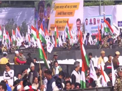 Ramlila Maidan covered with tricolours, echoes with patriotic songs ahead of Kejriwal's oath-ceremony | Ramlila Maidan covered with tricolours, echoes with patriotic songs ahead of Kejriwal's oath-ceremony