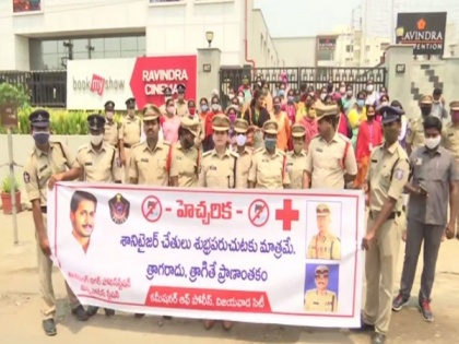 Vijayawada Police conducts awareness rally against consumption of sanitizers, drugs | Vijayawada Police conducts awareness rally against consumption of sanitizers, drugs
