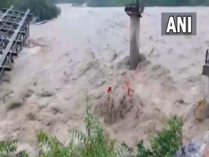 Uttarakhand rains: Swollen Chalthi river washes away under-construction bridge | Uttarakhand rains: Swollen Chalthi river washes away under-construction bridge Uttarakhand rains: Swollen Chalthi river washes away under-construction bridge | Uttarakhand rains: Swollen Chalthi river washes away under-construction bridge