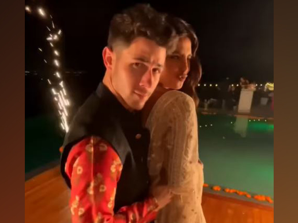 Priyanka Chopra and Nick Jonas celebrate Diwali at LA home. Spot their  framed wedding outfits - India Today