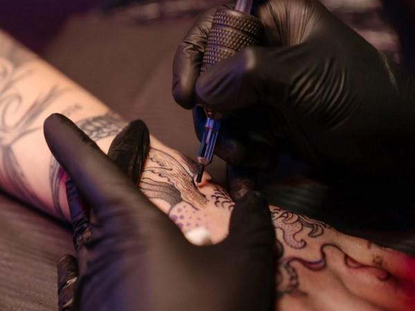Popular tattoo artist honed art at place hes striving to avoid
