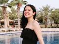 Anushka Sharma flaunts her baby bump wearing a strapless monokini in a pool - Hindi News | Anushka Sharma flaunts her baby bump wearing a strapless monokini in a pool | Latest entertainment News at Lokmattimes.com