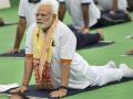 Watch: PM Modi performs Yoga during mega event at UN HQ - Hindi News | Watch: PM Modi performs Yoga during mega event at UN HQ | Latest international News at Lokmattimes.com