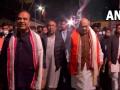 Manipur Assembly Elections 2022: Amit Shah distributes party manifesto pamphlets during the door-to-door campaign in Manipur - Hindi News | Manipur Assembly Elections 2022: Amit Shah distributes party manifesto pamphlets during the door-to-door campaign in Manipur | Latest politics News at Lokmattimes.com
