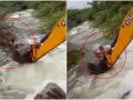 Viral Video! Home guard risks his own life to save dog stuck in overflowing stream - Hindi News | Viral Video! Home guard risks his own life to save dog stuck in overflowing stream | Latest social-viral News at Lokmattimes.com