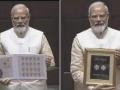 PM Modi releases special stamp, Rs 75 coin to mark inauguration of new Parliament Building - Hindi News | PM Modi releases special stamp, Rs 75 coin to mark inauguration of new Parliament Building | Latest national News at Lokmattimes.com