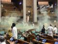 Two detained for protesting outside Parliament carrying cans emitting smoke - Hindi News | Two detained for protesting outside Parliament carrying cans emitting smoke | Latest national News at Lokmattimes.com