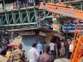 Mira Road Anti-Encroachment Drive: MBMC Demolishes Illegal Shops Near Railway Station (Watch Video) - Hindi News | Mira Road Anti-Encroachment Drive: MBMC Demolishes Illegal Shops Near Railway Station (Watch Video) | Latest mumbai News at Lokmattimes.com