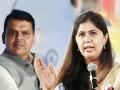 BJP's Pankaja Munde and Devendra Fadnavis bridge differences, share dais at govt event in Beed - Hindi News | BJP's Pankaja Munde and Devendra Fadnavis bridge differences, share dais at govt event in Beed | Latest maharashtra News at Lokmattimes.com