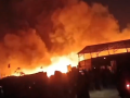 Noida Fire: Massive Blaze Erupts in Slums Near Bahlolpur Village in Uttar Pradesh (Watch Video) - Hindi News | Noida Fire: Massive Blaze Erupts in Slums Near Bahlolpur Village in Uttar Pradesh (Watch Video) | Latest national News at Lokmattimes.com