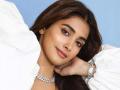 Pooja Hegde refutes rumours of producer gifting her a car - Hindi News | Pooja Hegde refutes rumours of producer gifting her a car | Latest entertainment News at Lokmattimes.com