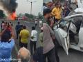 Pune Navale Bridge Accident: Car Trapped Between Containers Catches Fire, Several Injured (Watch Video) - Hindi News | Pune Navale Bridge Accident: Car Trapped Between Containers Catches Fire, Several Injured (Watch Video) | Latest pune News at Lokmattimes.com