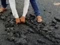 Watch: Nanded Man Tears Tar Road With Bare Hands, Exposes Poor Construction - Hindi News | Watch: Nanded Man Tears Tar Road With Bare Hands, Exposes Poor Construction | Latest maharashtra News at Lokmattimes.com