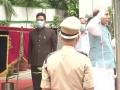 Defence Minister Rajnath Singh unfurls the national flag at his residence - Hindi News | Defence Minister Rajnath Singh unfurls the national flag at his residence | Latest national News at Lokmattimes.com