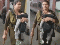 RPF Constable Seen Performing Duty While Carrying Baby on New Delhi Railway Station Amid Stampede, Video Surfaces - Hindi News | RPF Constable Seen Performing Duty While Carrying Baby on New Delhi Railway Station Amid Stampede, Video Surfaces | Latest national News at Lokmattimes.com