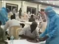 Viral Video! Waiters wearing PPE kit while serving guests in Andhra Pradesh wedding - Hindi News | Viral Video! Waiters wearing PPE kit while serving guests in Andhra Pradesh wedding | Latest social-viral News at Lokmattimes.com