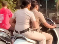 Mumbai traffic police fine two female officers for riding without helmets - Hindi News | Mumbai traffic police fine two female officers for riding without helmets | Latest maharashtra News at Lokmattimes.com