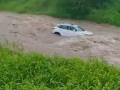 Rajasthan Rains: Car Carrying Four Swept Away by Strong Currents While Crossing Flooded Bridge in Rajsamand (Watch Video) - Hindi News | Rajasthan Rains: Car Carrying Four Swept Away by Strong Currents While Crossing Flooded Bridge in Rajsamand (Watch Video) | Latest national News at Lokmattimes.com