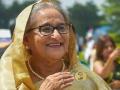 Sheikh Hasina Resigns: Bangladesh Protesters Storm Former PM's Residence Loot Fish, Chicken and Furniture (Watch Video) - Hindi News | Sheikh Hasina Resigns: Bangladesh Protesters Storm Former PM's Residence Loot Fish, Chicken and Furniture (Watch Video) | Latest international News at Lokmattimes.com