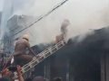 Siliguri Bidhan Market Fire: Massive Blaze Erupts at Cloth Shop, Spreads to Nearby Stores (Watch Video) - Hindi News | Siliguri Bidhan Market Fire: Massive Blaze Erupts at Cloth Shop, Spreads to Nearby Stores (Watch Video) | Latest national News at Lokmattimes.com