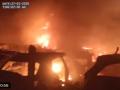 Surat Fire: Massive Blaze Engulfs Scrap Shops and Vehicles Near Kamej Toll Plaza - Hindi News | Surat Fire: Massive Blaze Engulfs Scrap Shops and Vehicles Near Kamej Toll Plaza | Latest national News at Lokmattimes.com