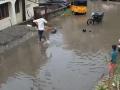 Chennai: Man Saves Schoolboy from Electrocution in Waterlogged Street; Video Goes Viral - Hindi News | Chennai: Man Saves Schoolboy from Electrocution in Waterlogged Street; Video Goes Viral | Latest national News at Lokmattimes.com