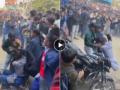 VIDEO: Girls Fight with Belts, Boys Dance Behind Them in Viral School Brawl, Netizens React - Hindi News | VIDEO: Girls Fight with Belts, Boys Dance Behind Them in Viral School Brawl, Netizens React | Latest social-viral News at Lokmattimes.com