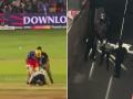 Virat Kohli’s Fan, Who Invaded Pitch During RCB vs Punjab Kings Match, Thrashed by Security; Video Goes Viral - Hindi News | Virat Kohli’s Fan, Who Invaded Pitch During RCB vs Punjab Kings Match, Thrashed by Security; Video Goes Viral | Latest social-viral News at Lokmattimes.com