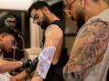 Virat Kohli Gets New Tattoo Before IPL 2026: Know Meaning Behind His Full-Sleeve Ink (Watch Video) - Hindi News | Virat Kohli Gets New Tattoo Before IPL 2026: Know Meaning Behind His Full-Sleeve Ink (Watch Video) | Latest cricket News at Lokmattimes.com