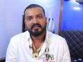 Bigg Boss Kannada 10 contestant Varthur Santhosh arrested for wearing ‘tiger claw’ pendant - Hindi News | Bigg Boss Kannada 10 contestant Varthur Santhosh arrested for wearing ‘tiger claw’ pendant | Latest entertainment News at Lokmattimes.com