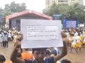 Mumbai Krishna Janmashtami 2024 Celebrations: Child at Worli Dahi Handi Event Holds Poster Demanding Swift Justice for Rape Victims - Hindi News | Mumbai Krishna Janmashtami 2024 Celebrations: Child at Worli Dahi Handi Event Holds Poster Demanding Swift Justice for Rape Victims | Latest mumbai News at Lokmattimes.com