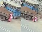 Gujarat: Woman Distracted by Phone Comes Under Reversing Tractor in Surat; Major Tragedy Averted (Video)