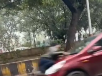 Greater Noida Shock: Traffic Cop Dragged on Car Bonnet for 500 Metres, Driver Flees - News | Greater Noida Shock: Traffic Cop Dragged on Car Bonnet for 500 Metres, Driver Flees | Latest national News at Lokmattimes.com