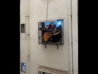 Surat: Man Narrowly Escapes Death After Getting Stuck on 8th Floor While Slipping From 10th Floor; Nail-Biting Video Goes Viral - News | Surat: Man Narrowly Escapes Death After Getting Stuck on 8th Floor While Slipping From 10th Floor; Nail-Biting Video Goes Viral | Latest national News at Lokmattimes.com