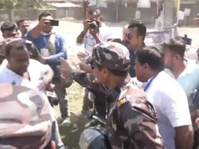 BJP's Bengal Chief Confronts TMC Workers Chanting 'Go Back' Slogans Amid Polling in Balurghat BJP's Bengal Chief Confronts TMC Workers Chanting 'Go Back' Slogans Amid Polling in Balurghat