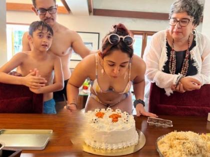 Ira Khan cuts her birthday cake in a yellow bikini as Aamir Khan's daughter turns a year older | Ira Khan cuts her birthday cake in a yellow bikini as Aamir Khan's daughter turns a year older