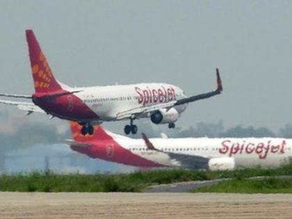 Delhi bound SpiceJet plane catches fire mid air, lands in Patna; all safe | Delhi bound SpiceJet plane catches fire mid air, lands in Patna; all safe