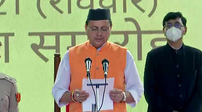 Pushkar Singh Dhami sworn in as Chief minister of Uttarakhand | Pushkar Singh Dhami sworn in as Chief minister of Uttarakhand