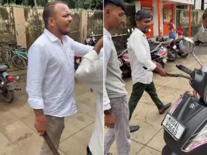 Thane: Shinde Sena Leader Brandishes Sword Over Parking Dispute, Injures Man During Confrontation | Thane: Shinde Sena Leader Brandishes Sword Over Parking Dispute, Injures Man During Confrontation Thane: Shinde Sena Leader Brandishes Sword Over Parking Dispute, Injures Man During Confrontation | Thane: Shinde Sena Leader Brandishes Sword Over Parking Dispute, Injures Man During Confrontation