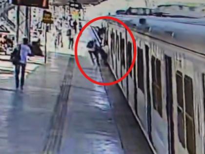 Palghar: Alert Passenger Saves Woman Who Fell While Boarding Moving Mumbai Local Train; CCTV Video Emerges | Palghar: Alert Passenger Saves Woman Who Fell While Boarding Moving Mumbai Local Train; CCTV Video Emerges Palghar: Alert Passenger Saves Woman Who Fell While Boarding Moving Mumbai Local Train; CCTV Video Emerges | Palghar: Alert Passenger Saves Woman Who Fell While Boarding Moving Mumbai Local Train; CCTV Video Emerges