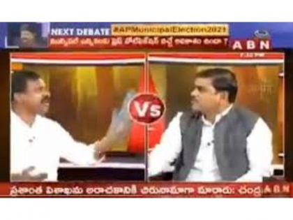 Shocking Video! Amaravati activist hits BJP leader with slipper during live TV debate | Shocking Video! Amaravati activist hits BJP leader with slipper during live TV debate