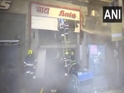 Mumbai Fire: Blaze Erupts at Footwear Shop in Mumbai’s Fort Area; No Injuries Reported | Mumbai Fire: Blaze Erupts at Footwear Shop in Mumbai’s Fort Area; No Injuries Reported Mumbai Fire: Blaze Erupts at Footwear Shop in Mumbai’s Fort Area; No Injuries Reported | Mumbai Fire: Blaze Erupts at Footwear Shop in Mumbai’s Fort Area; No Injuries Reported
